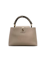 Louis Vuitton Taupe 
24 
Capucines
 MM Taurillon Leather Ayers-Snakeskin Trim