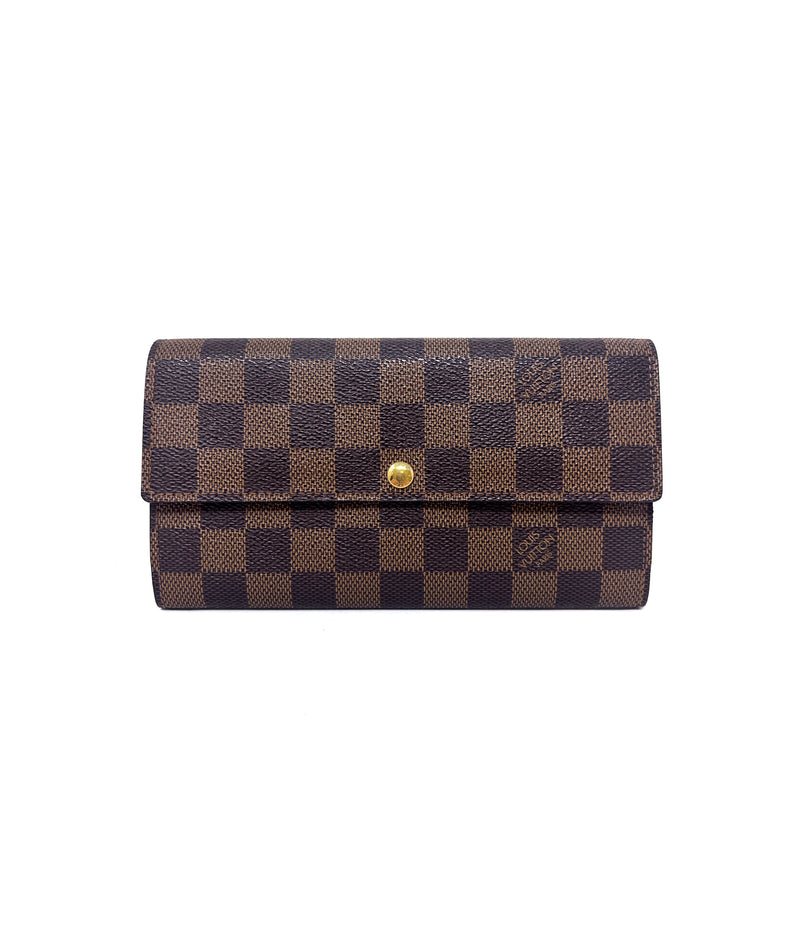 Louis Vuitton 
11 
Sarah
 Canvas Flap Wallet