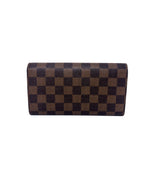 Louis Vuitton 
11 
Sarah
 Canvas Flap Wallet