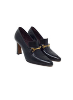 The Row Black 
Lady
 Leather Buckle Heeedl Loafers