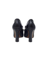 The Row Black 
Lady
 Leather Buckle Heeedl Loafers