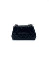 Chanel 
14-
15 Quilted Patent Leather Mini Flap Crossbody