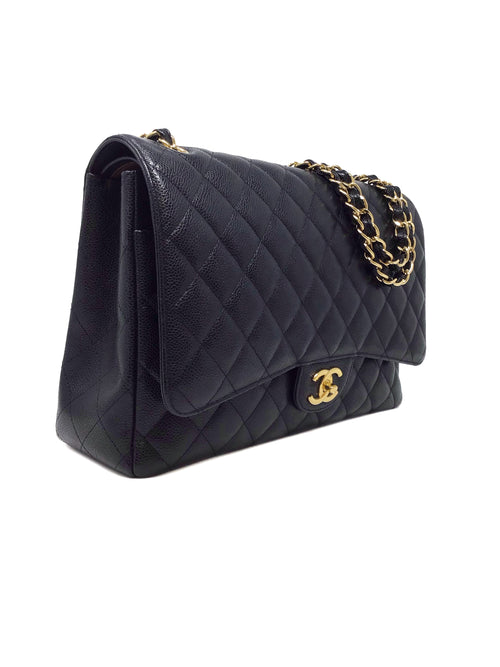 Chanel Black/Gold 
14-
15 Maxi Caviar Double Flap