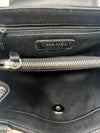 Chanel 
14-
15 Quilted Patent Leather Mini Flap Crossbody