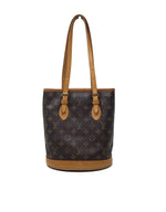 Louis Vuitton 
03 
Bucket
 PM Monogram Canvas W/Pochette