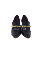 The Row Black 
Lady
 Leather Buckle Heeedl Loafers