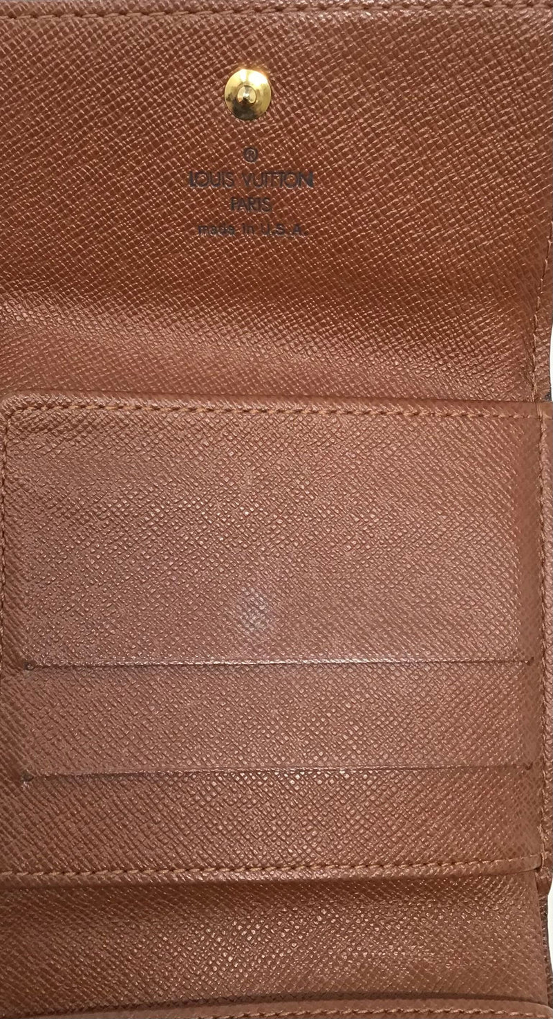 Louis Vuitton 
04  
Elise
 Snap Tri-Fold Wallet