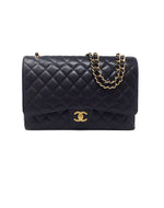 Chanel Black/Gold 
14-
15 Maxi Caviar Double Flap