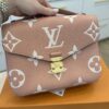 Louis Vuitton Bicolor Monogram Empreinte Leather Pochette Metis