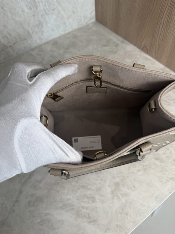 Louis Vuitton Onthego PM Bicolor Monogram Empreinte Leather Dove and Cream