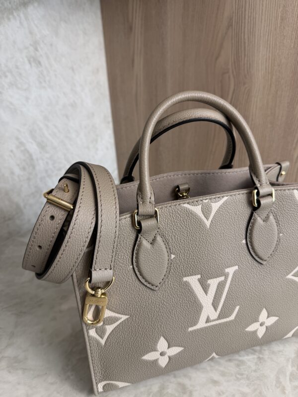 Louis Vuitton Onthego PM Bicolor Monogram Empreinte Leather Dove and Cream