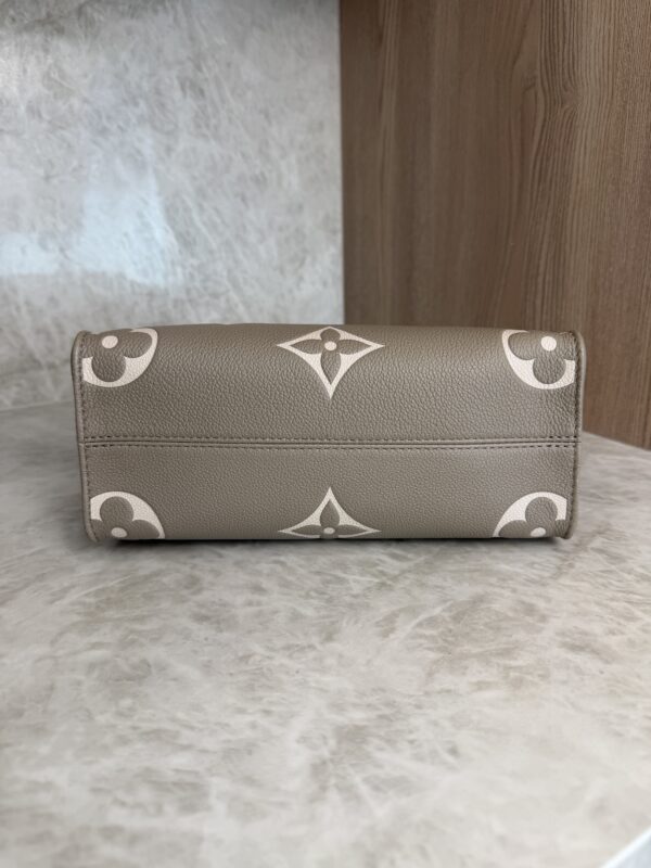 Louis Vuitton Onthego PM Bicolor Monogram Empreinte Leather Dove and Cream