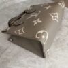 Louis Vuitton Onthego PM Bicolor Monogram Empreinte Leather Dove and Cream