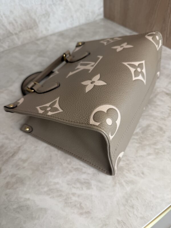 Louis Vuitton Onthego PM Bicolor Monogram Empreinte Leather Dove and Cream