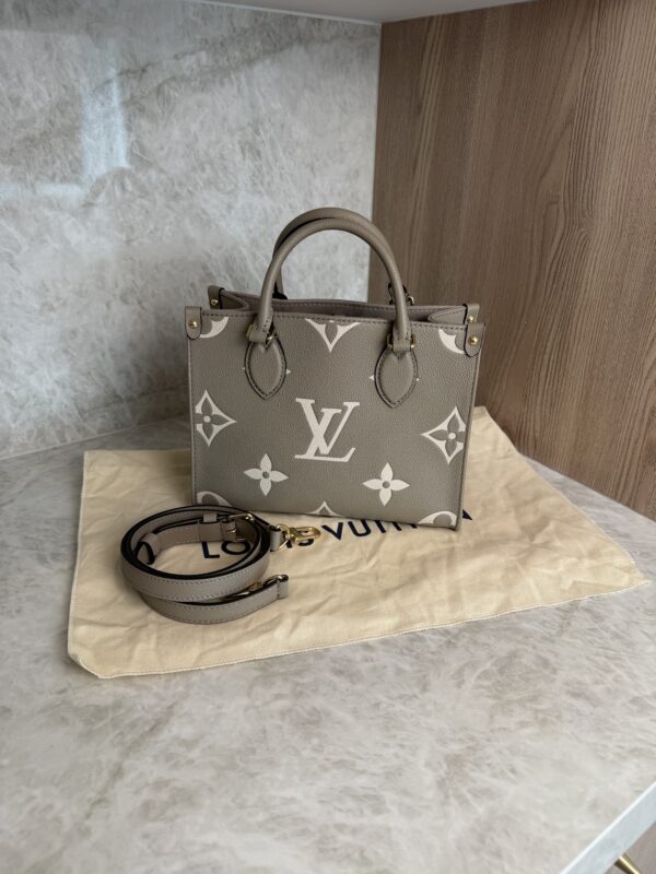 Louis Vuitton Onthego PM Bicolor Monogram Empreinte Leather Dove and Cream